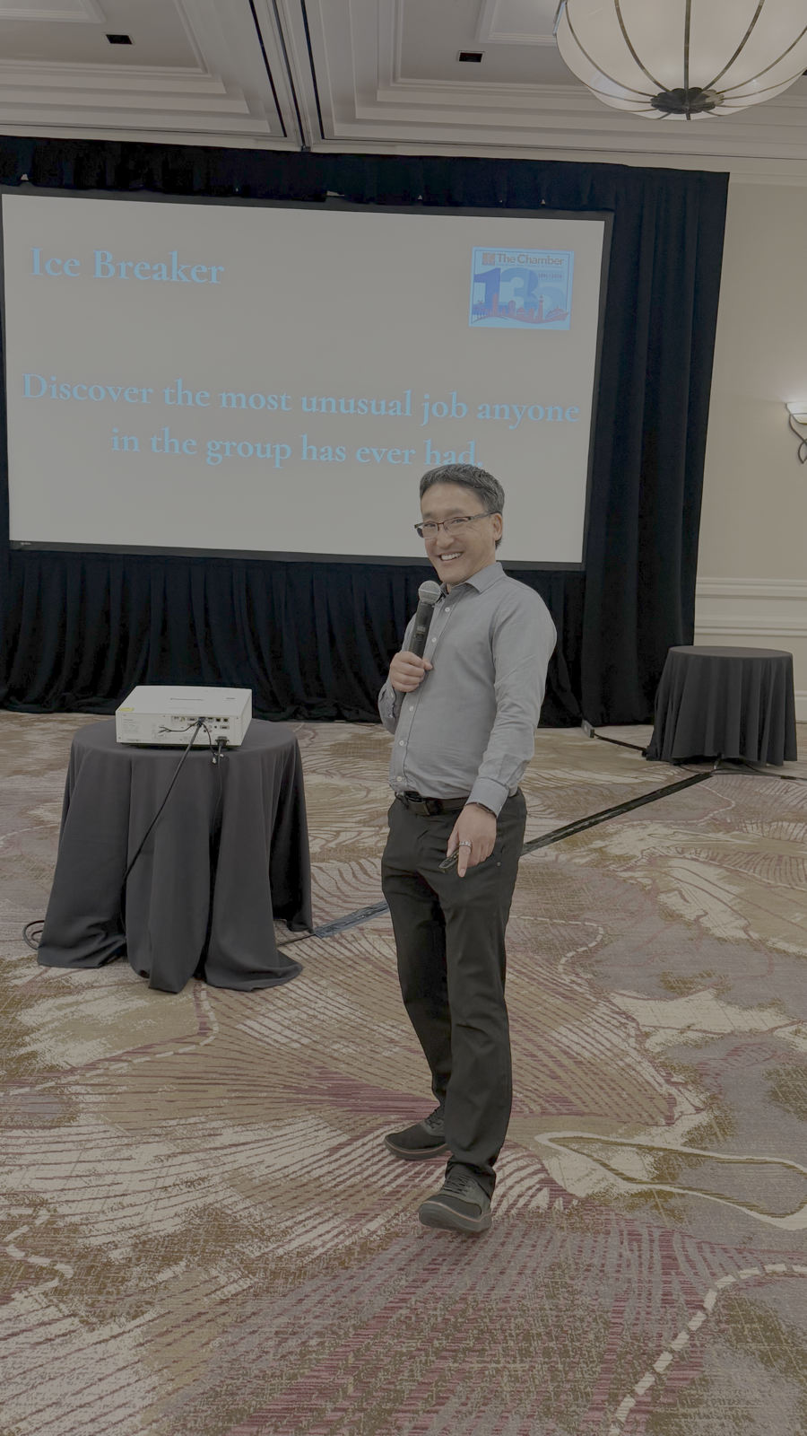 Stuart Takehara presents an icebreaker activity at a Chamber board retreat